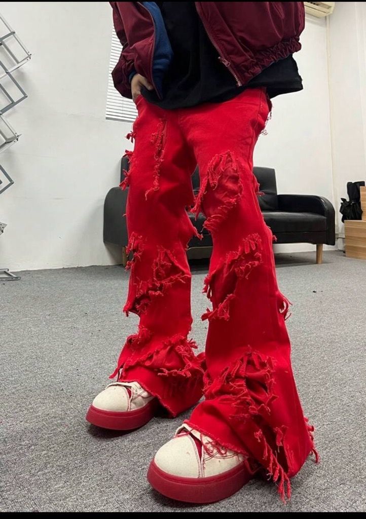 Flared Jeans With Ripped Design